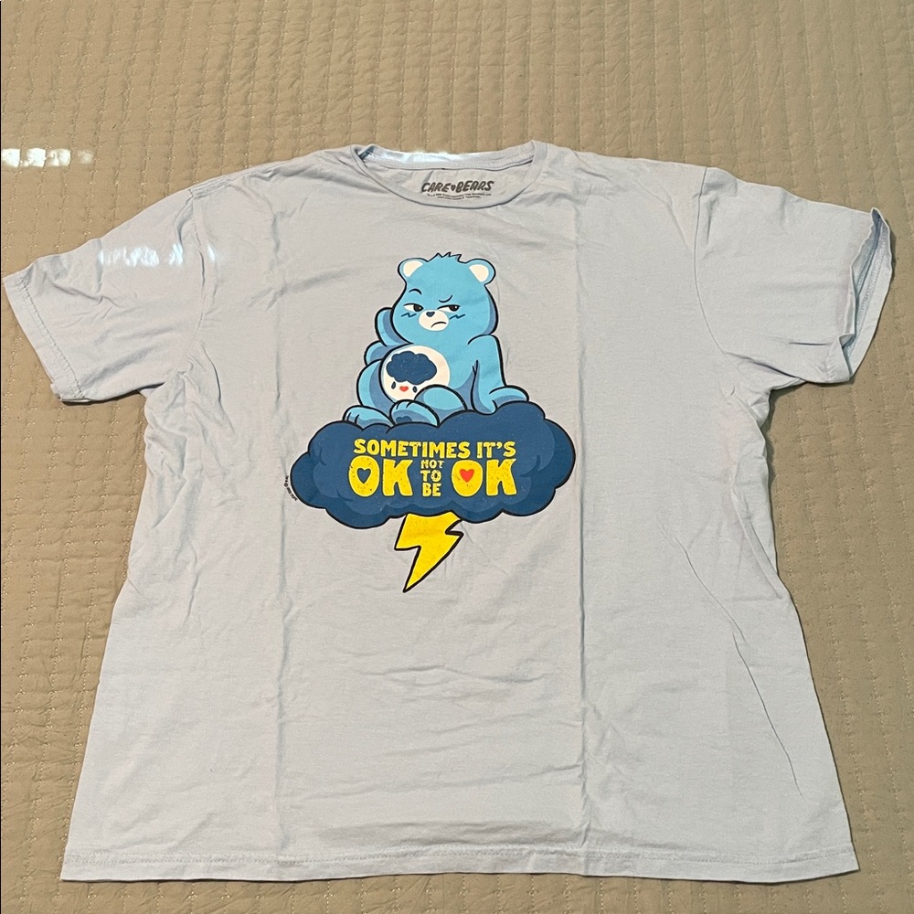 Care Bears baby blue T-Shirt with Grumpy Bear Graphic